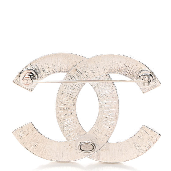 Kristallbesetzter Anstecker aus Edelstahl